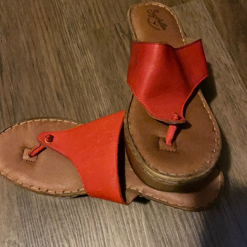 Leather Orange thong sandals only worn 1 time.